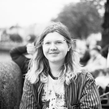 Raina O'Sullivan holding a camera